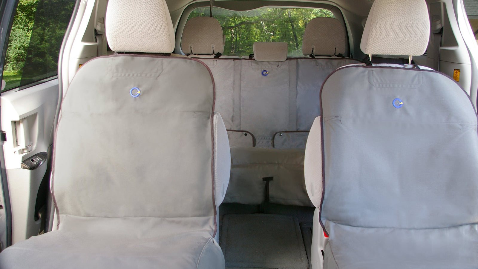 Full vehicle equipped with Optimus Gear SeatShields showing single/front/captain style seats and rear seat with bench style SeatShield