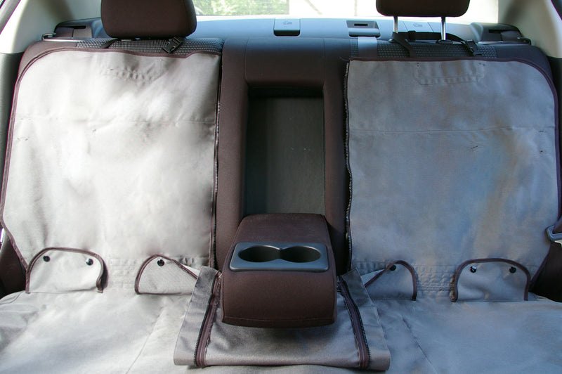 Bench rear seat cover with zippered back allowing center console to be folded down